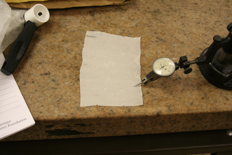 Inspecting depth of groove on latex peel